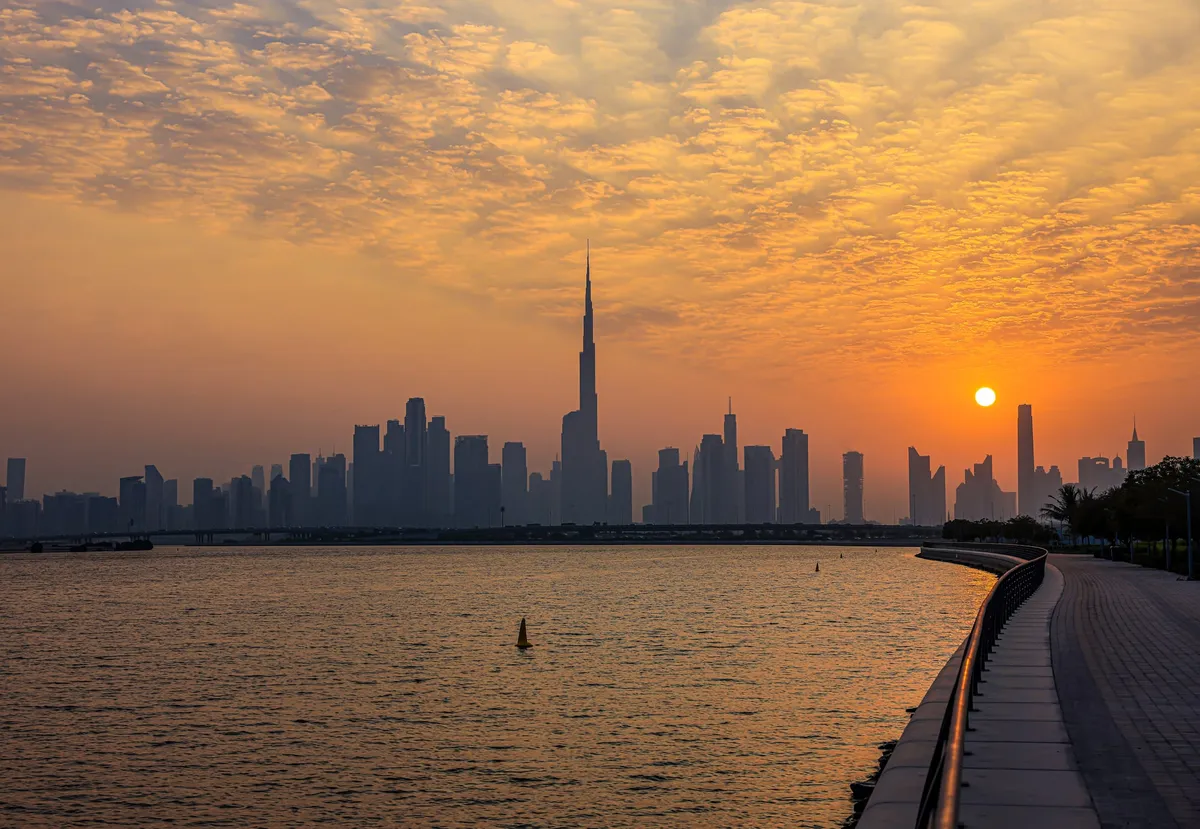 Al Jaddaf Walk waterfront promenade with city skyline in the background