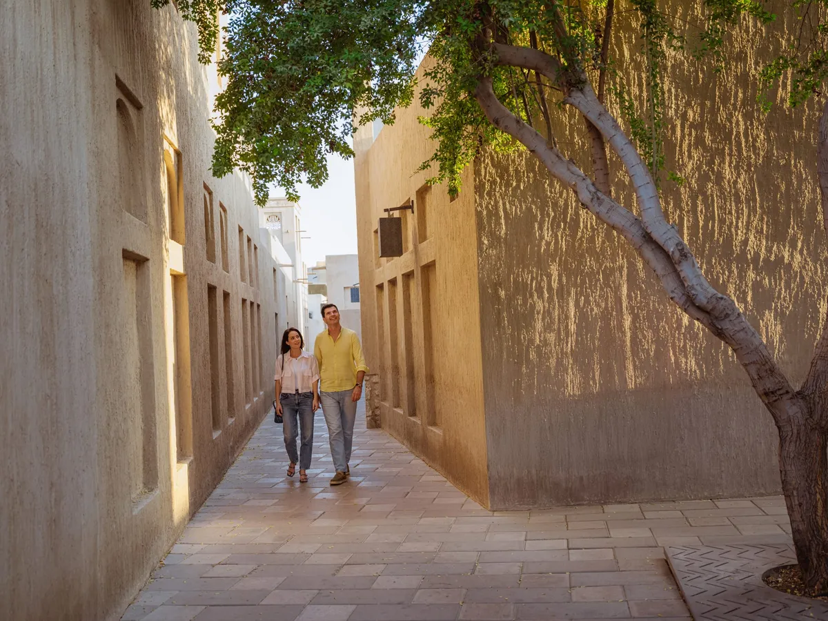 Narrow lanes and traditional wind-tower buildings of Al Fahidi Historical Neighbourhood in Dubai